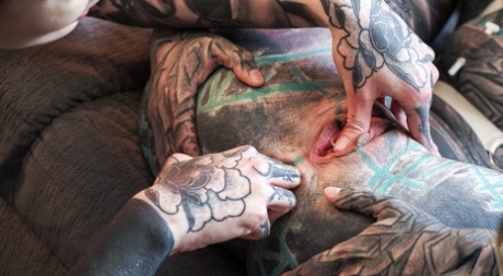 Heavily tattooed lesbians Anuskatzz & Nux Vomica use a strapon during sex 72125460