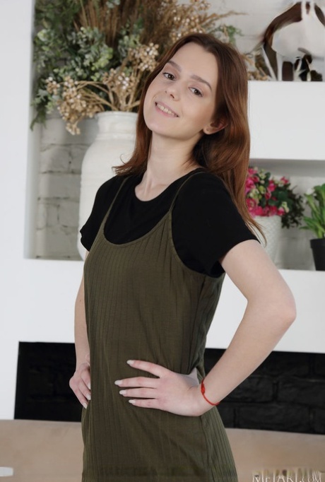 Young girl Amber Plume strips down to her birthday suit on a loveseat 96081429