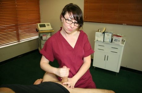 Medical secretary Dakota Charms gets naked jerks off a guy in examination room 63009907