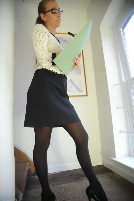 Hot UK blonde Hayley Marie Coppin lets her hair down in a girdle and stockings 32806333
