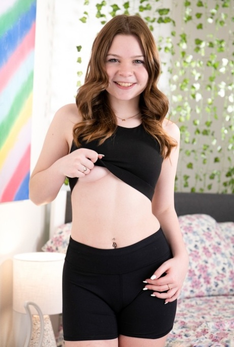 Teen lesbians Adrianna Jade and Scarlet Skies have sexual relations on a bed 32574287