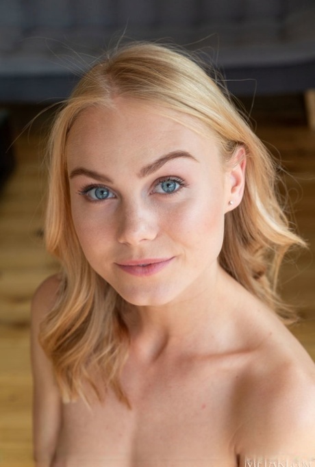 Beautiful blonde teen Nancy A discards a bodysuit to model in the nude 75750855
