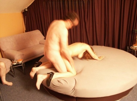German swingers Uschi Haller and Patty have group sex in a expansive bedroom 22777912