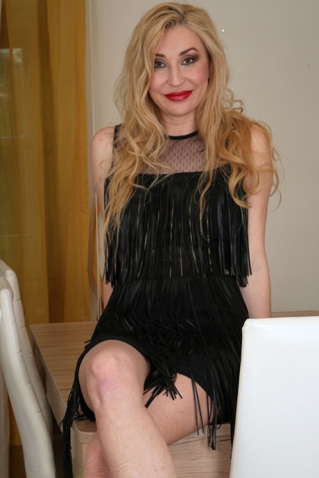 Over 30 blonde Mila May removes a cocktail dress while getting naked in pumps 80142982