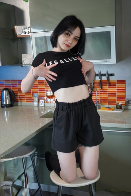 Dark haired teen Candy Black masturbates with a vibrator in black knee socks 92042374