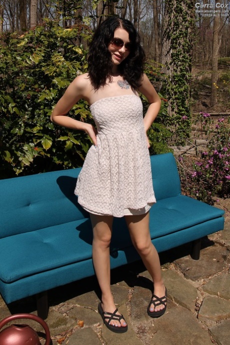 Brunette chick Corra Cox shaves and fists her pussy on patio furniture 17485303