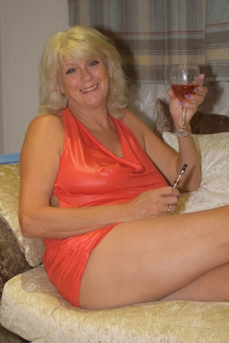 Older blonde Dimonty does away with a short dress and a thong to go nude 93483703