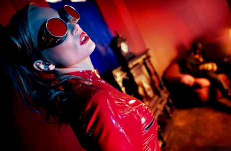 Hot MILF Diana Doll unzips latex bodysuit to ride a latex clad man's hard dick 46813104