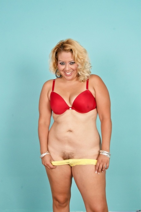 Fat blonde Savannah Tyler removes her black dress to model in her pretties 48961674