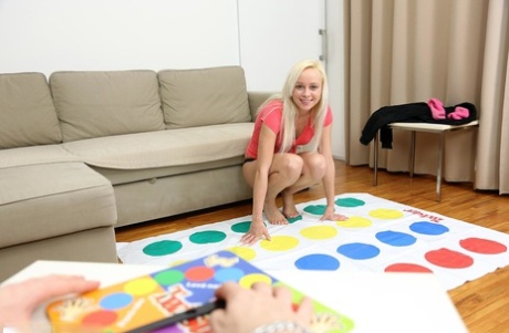 Young blonde girl gets fucked after playing a game of naked Twister 14719491