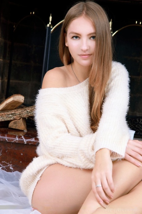 Beautiful Russian teen Izabel A exposes her yummy pussy during nude poses 90601567