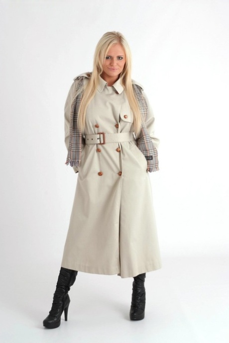 Platinum blonde chick Charlie G removes an overcoat to model lingerie in boots 96713220