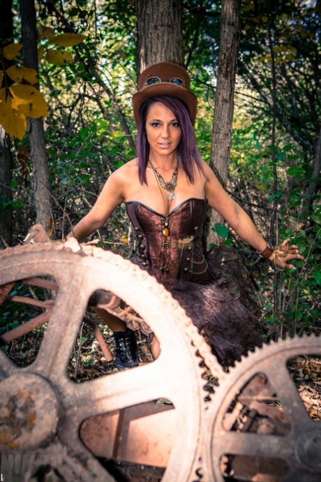 Amateur cosplay girl Nikki Sims in thong baring her firm boobs in the forest 10112804