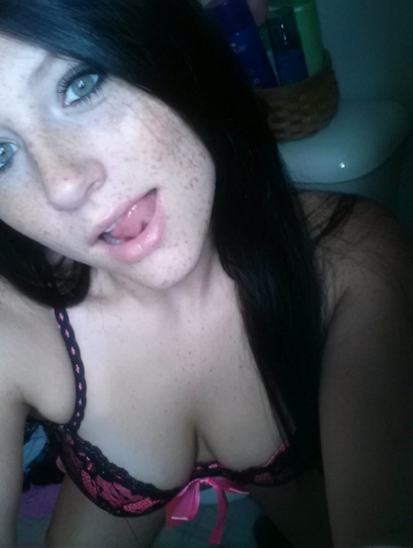 Self shot of amateur Freckles in stockings & sexy lingerie showing tongue 78174340