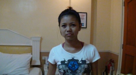 Young looking Asian girl in braces goes PTM during closeup action 68846886