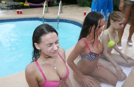 Lesbian orgy is featuring horny babes having fun outdoor at the pool 71442410