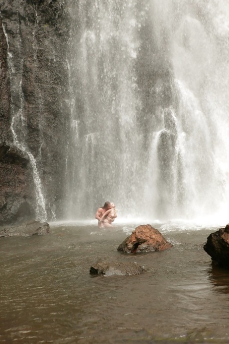 Stunning milf Jesse Jane fucks outdoor in the waterfall on cam 79556783