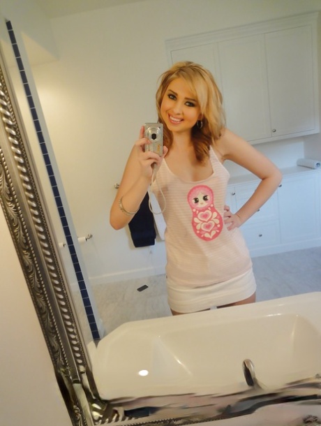 Blonde babe Molly Bennett does sexy self-shots in the bathroom 85127579