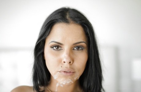 Buxom brunette MILF Diamond Kitty taking big cumshot on Latina face 13552834