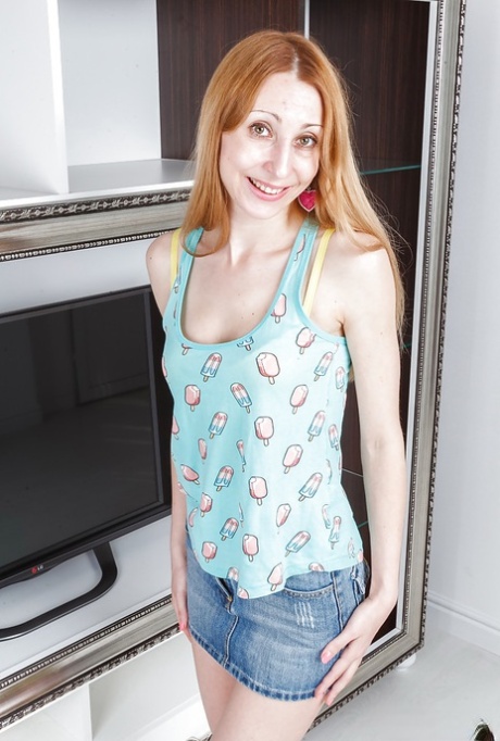 Skinny mature broad Kler posing fully clothed in denim mini-skirt and socks 24665803