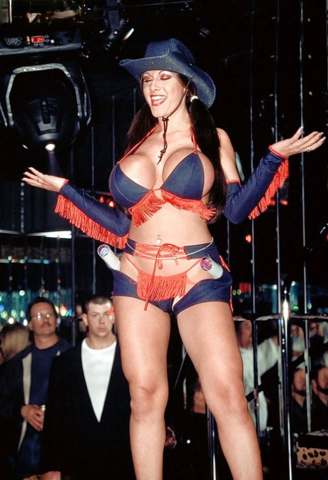 Busty MILF babe Crystal Gunns sheds cowgirl outfit at strip club 12081826