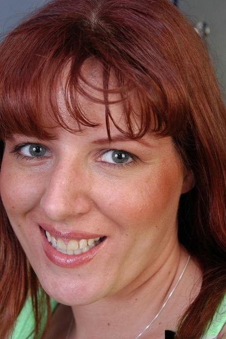 Mature redhead woman Tru poses half naked with drill in her hands 86110830