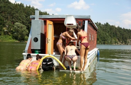 A group of teenage girls go rafting on a river in the nude 55038580