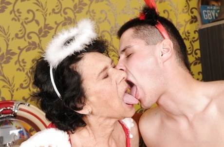 Granny in a sexy uniform teases her pussy and gets banged hard 73128694
