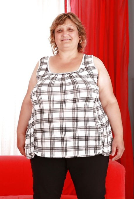 Fatty granny with huge boobs and ass stripping and spreading her legs 61037225