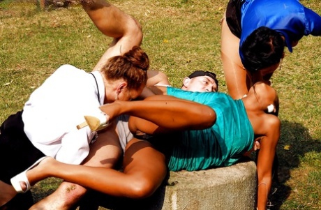 Lascivious gals with sexy legs are into group pissing action outdoor 76044104