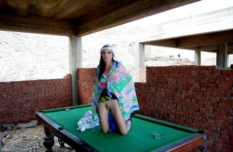 Fuckable brunette babe posing barely clothed on the pool table 64350858