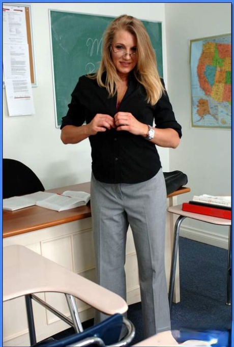 Luscious MILF teacher in glasses Porscha Ride strips from pink lingerie 17883292