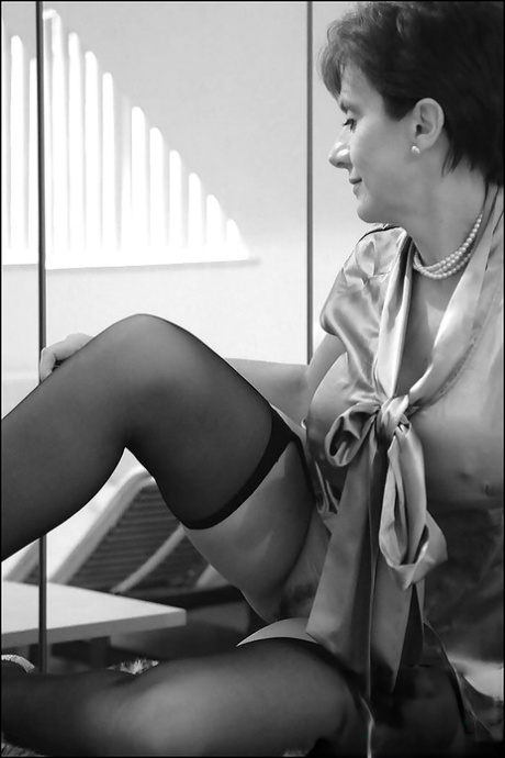 Sexy mature lady in stockings stripping and picturing herself 62724991