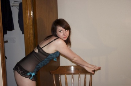 Playful brunette amateur slowly getting rid of her sexy lingerie 24364371