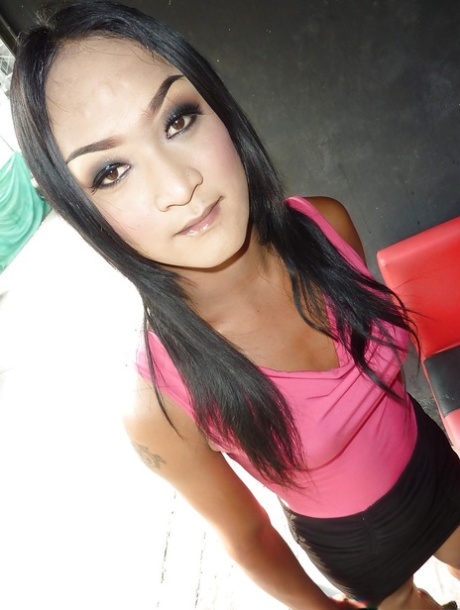 Elegant and slim Asian ladyboy plays with herself in the bathroom 20315981